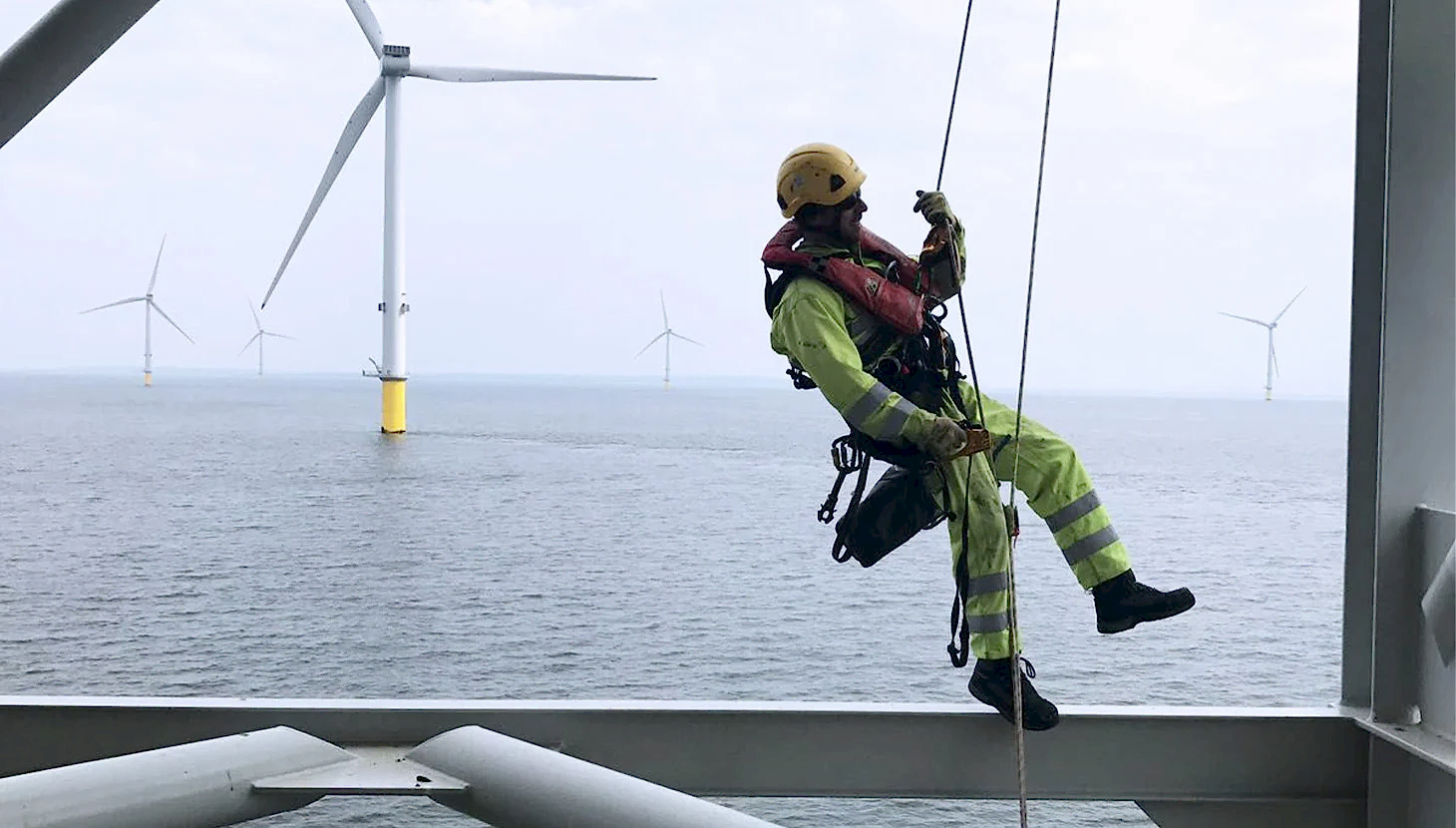 Man on wind turbine