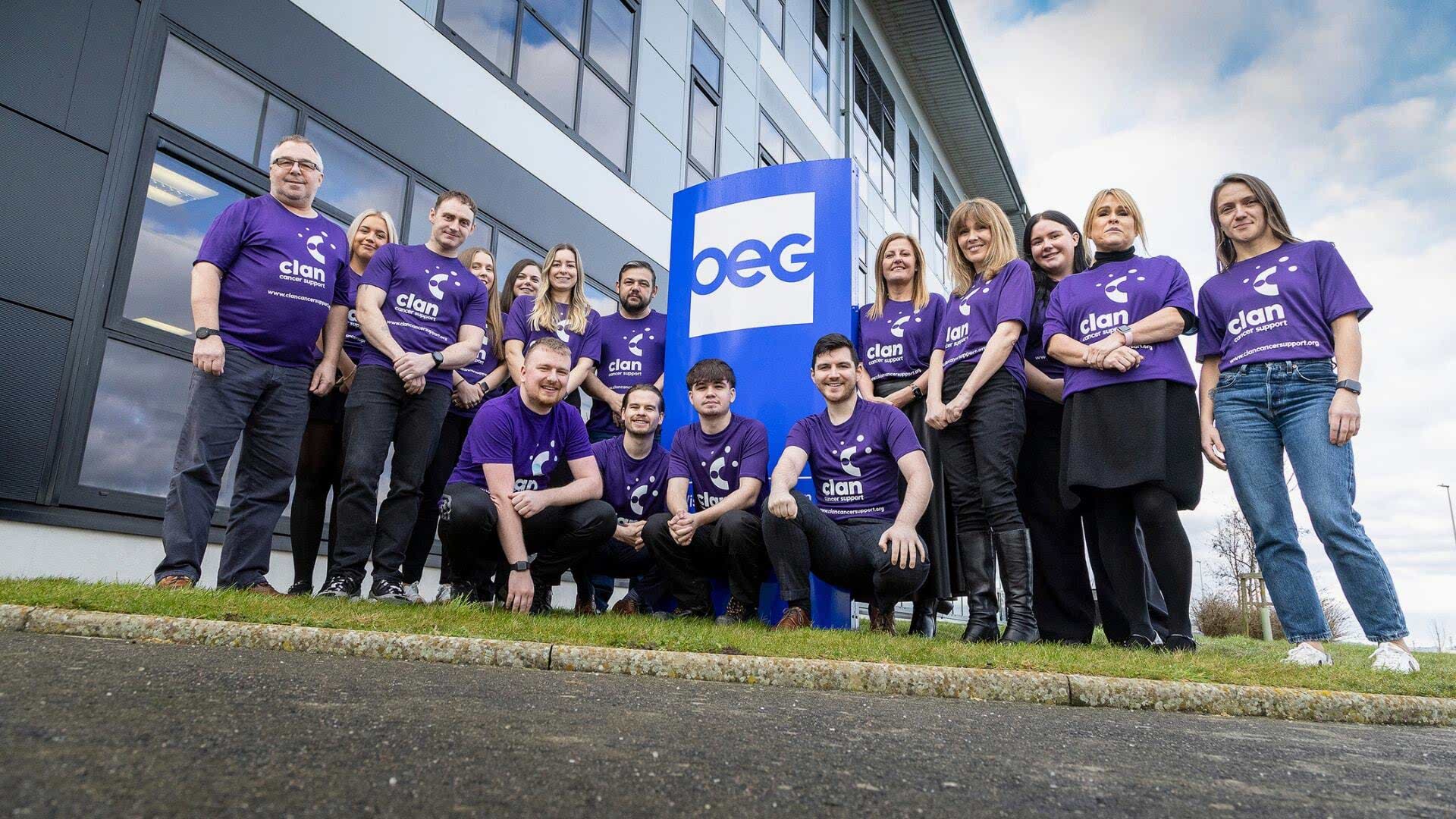 16 OEG Employees outside the Dyce, Aberdeen head office with CLAN Cancer Support charity T-shirts