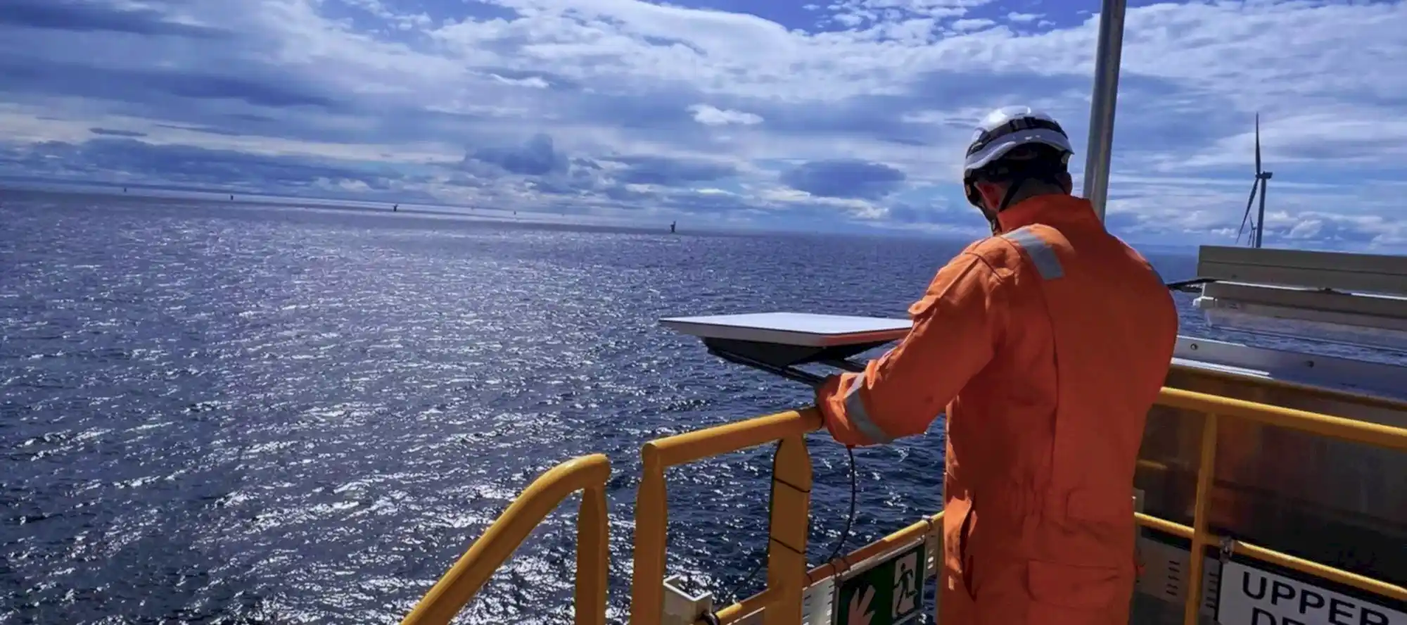 Offshore technology engineer looking out at sea