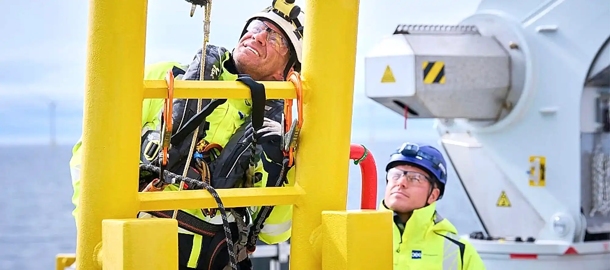 OEG engineers looking up ladder